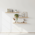 Set of 3 natural wood floating wall shelves with books, plants and decorative items
