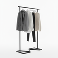 Freestanding Z-frame black metal clothing rack with hanging clothes